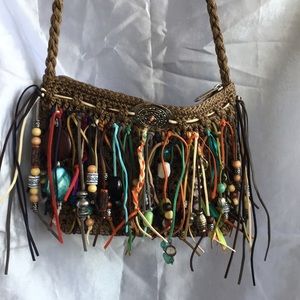 BOHO Crossbody crocheted purse with fringe.